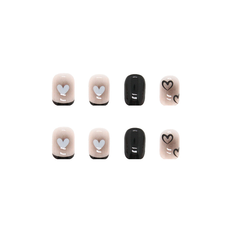 Black heart nail art press on nails with nude pink base
