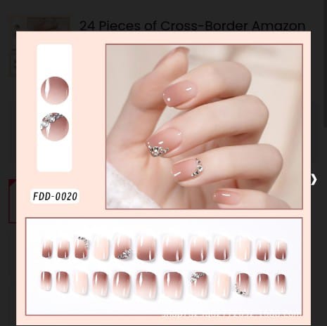 Nude pink 3D press on nails with rhinestone bow accents